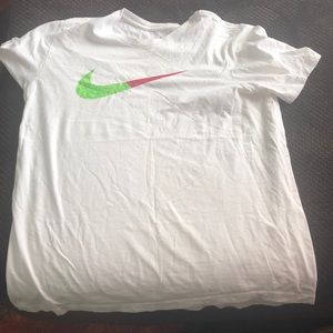 White Nike t shirt wit  red and green check on it